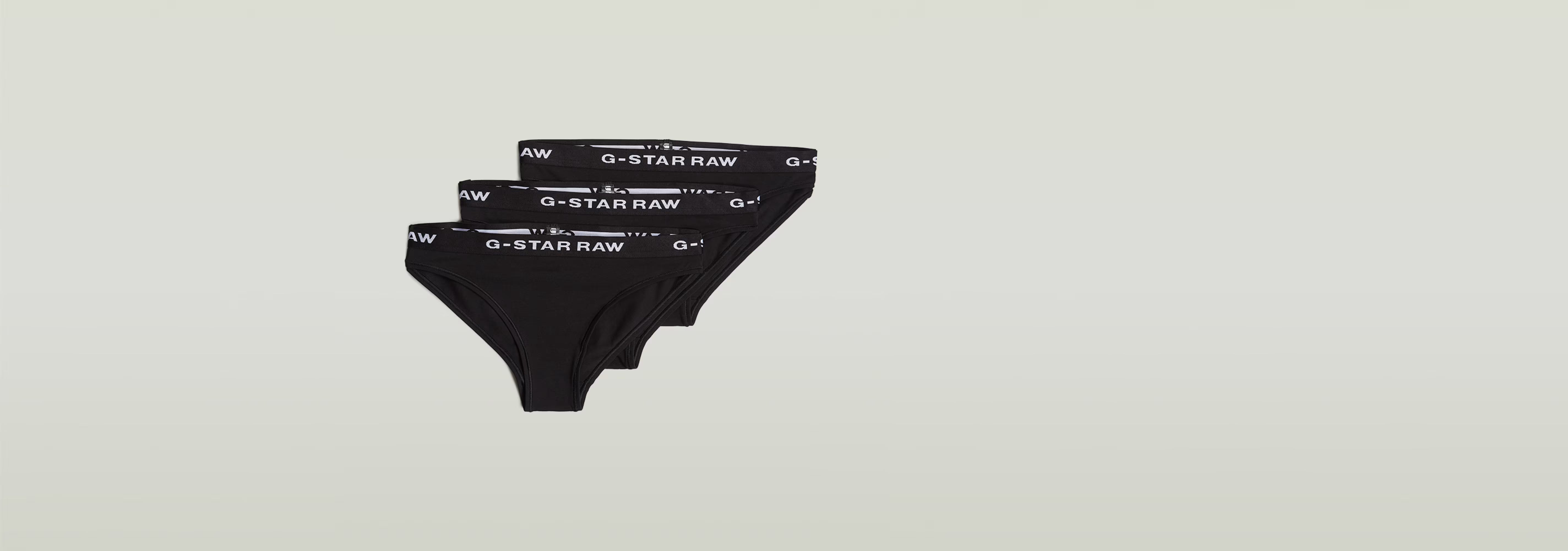 Paquete De Tres Braguitas de G-Star RAW en color negro, suaves y flexibles, con cinta elástica en la cinturilla.