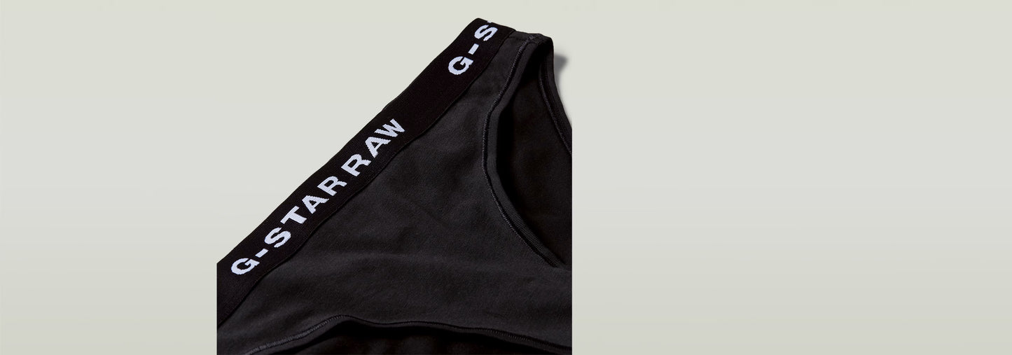 Paquete De Tres Braguitas con cinturilla elástica de G-Star RAW en color negro, suave y transpirable.