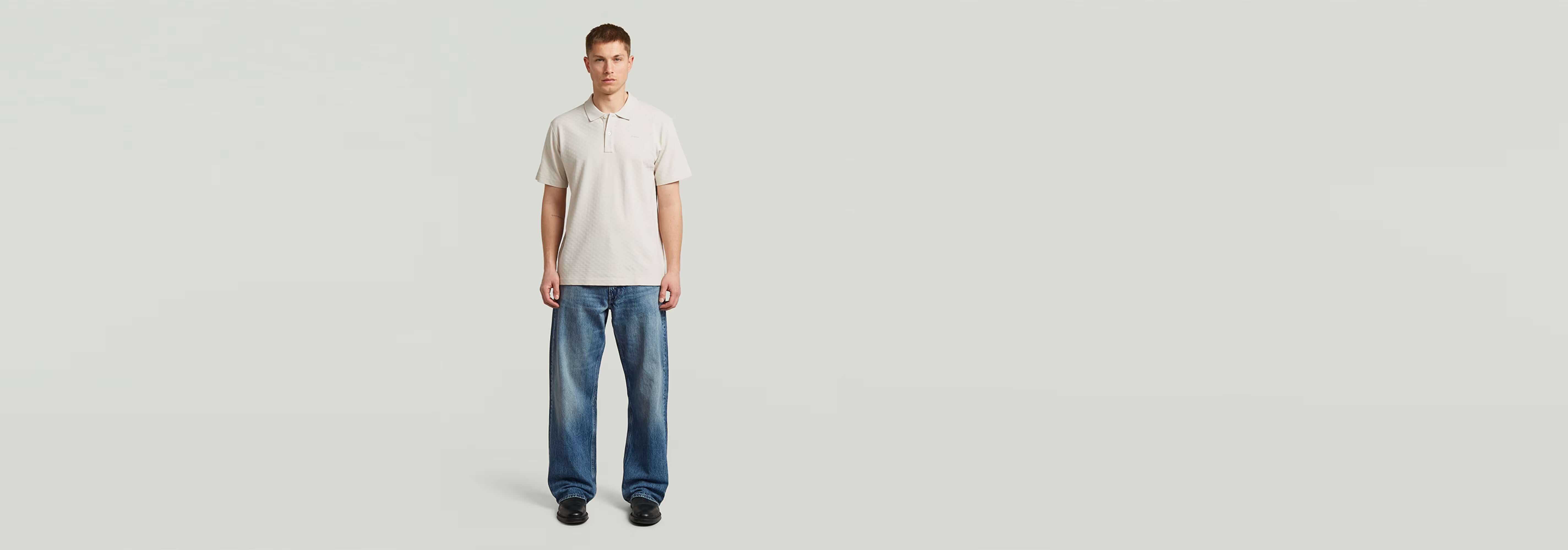 Polo Core Regular Jacquard on a model wearing jeans against a neutral background