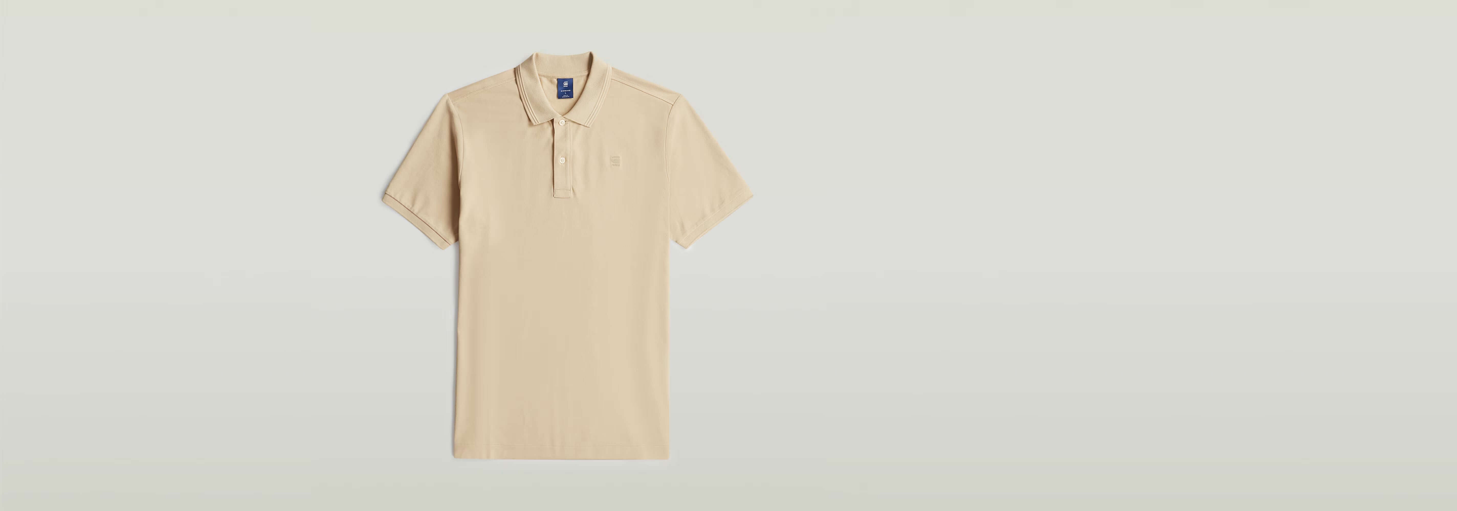 Polo Dunda Slim de color beige con diseño clásico y cuello acanalado, ideal para ocasiones casuales.
