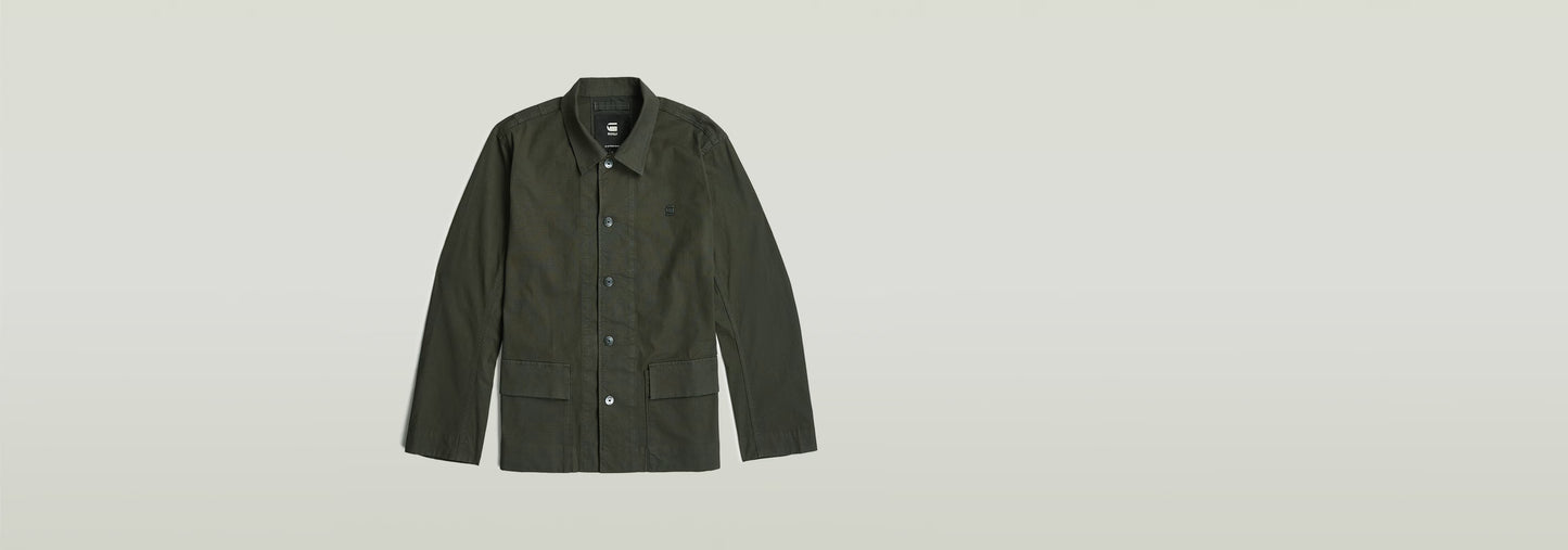 Sobrecamisa 2 Pocket en color verde, con cuello de camisa y botones a presión, dos bolsillos delanteros.