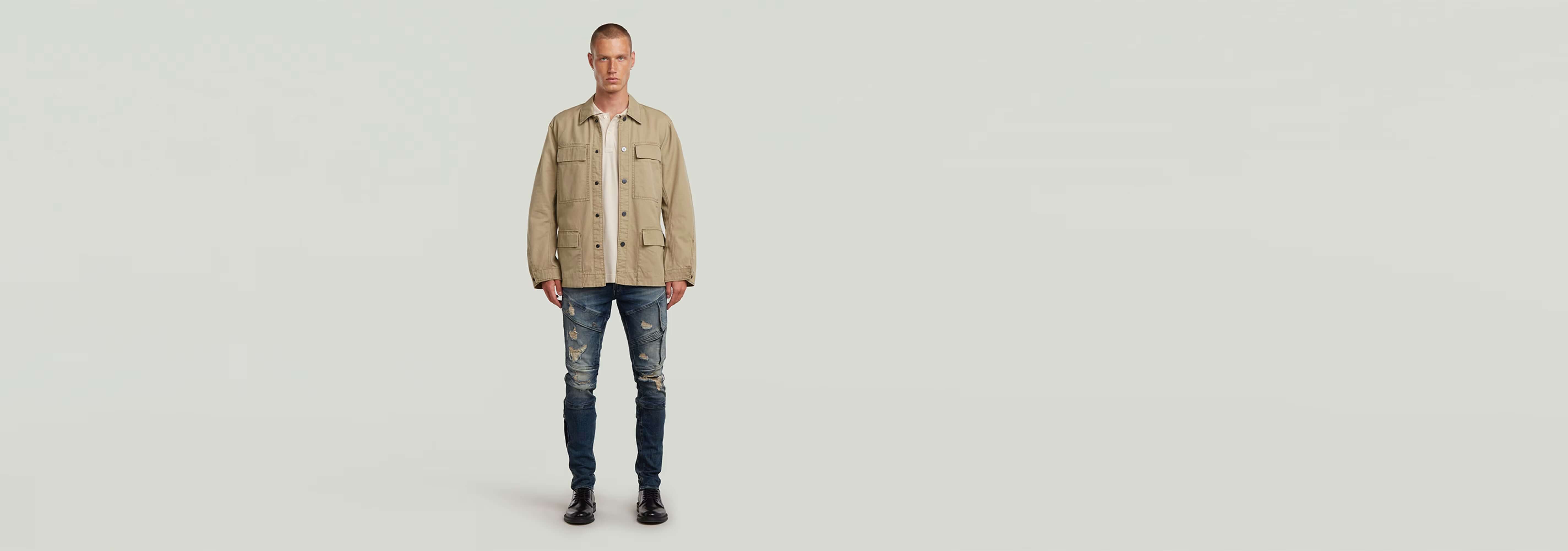 Modelo vistiendo la Sobrecamisa Reversible 4 Pocket en diseño elegante, con cuatro bolsillos y ajuste ceñido.