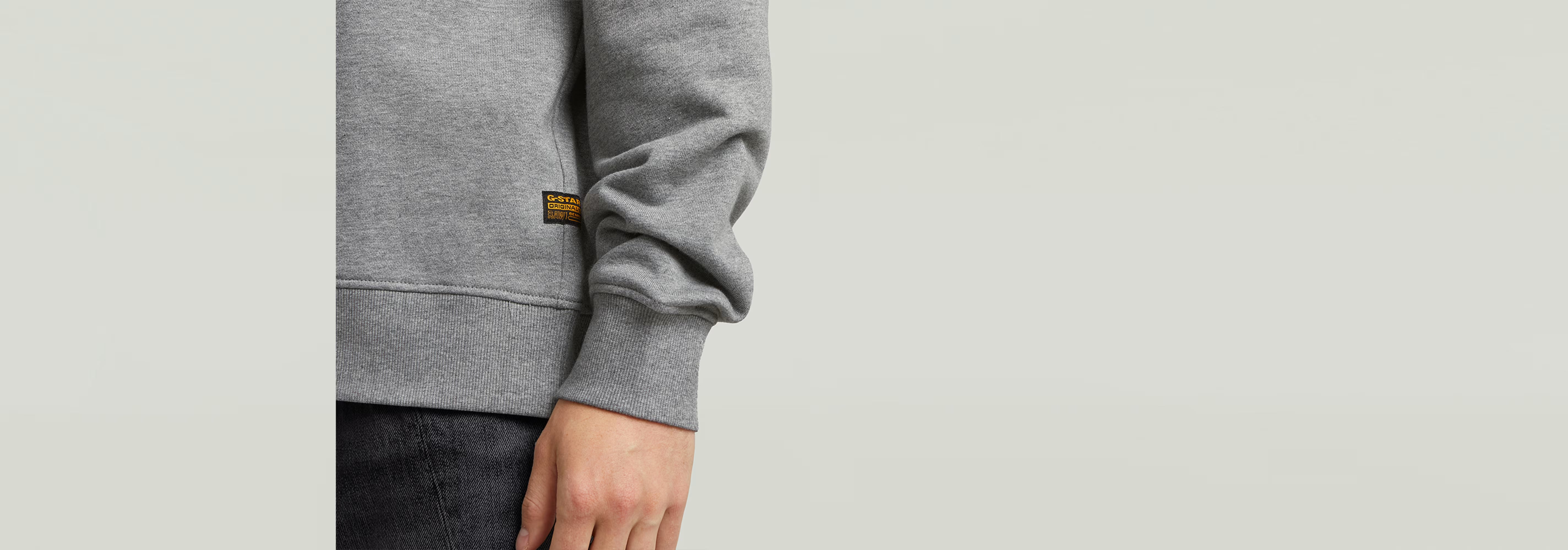 Sudadera Applique en gris, con puños y bajo acanalados, parte del diseño relajado y atrevido.