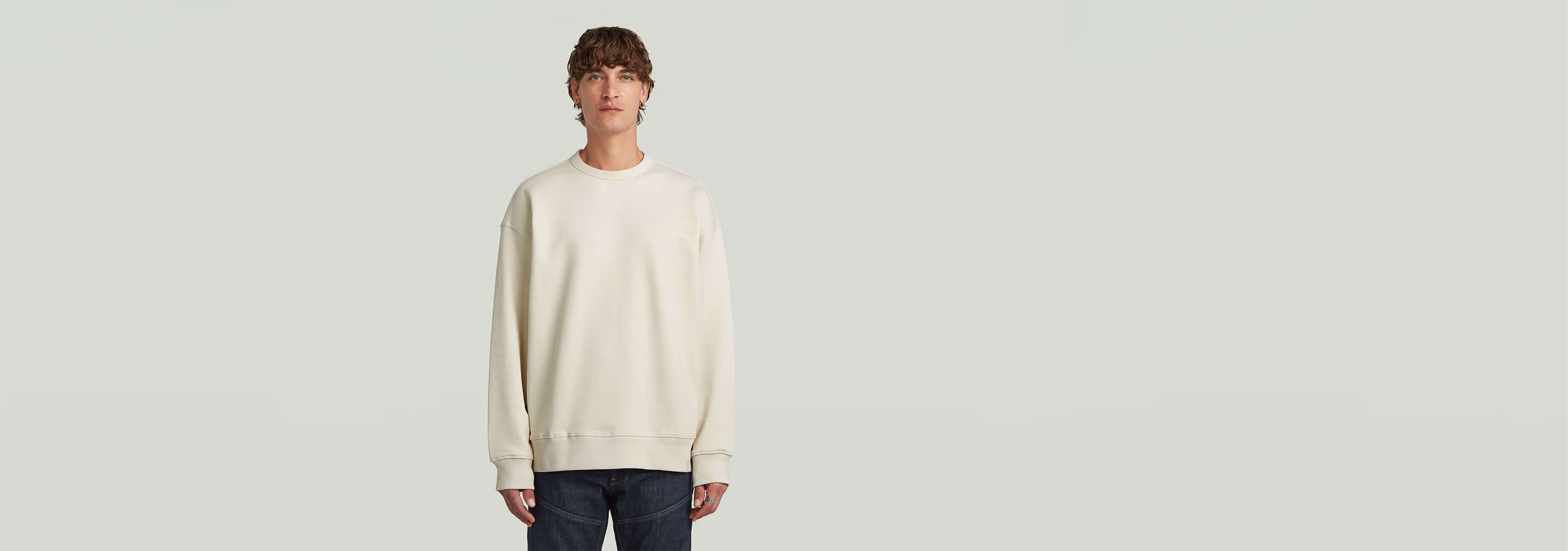 Sudadera GS-01 Relaxed en color claro, corte relajado, cuello redondo y manga larga, 100% algodón ecológico.