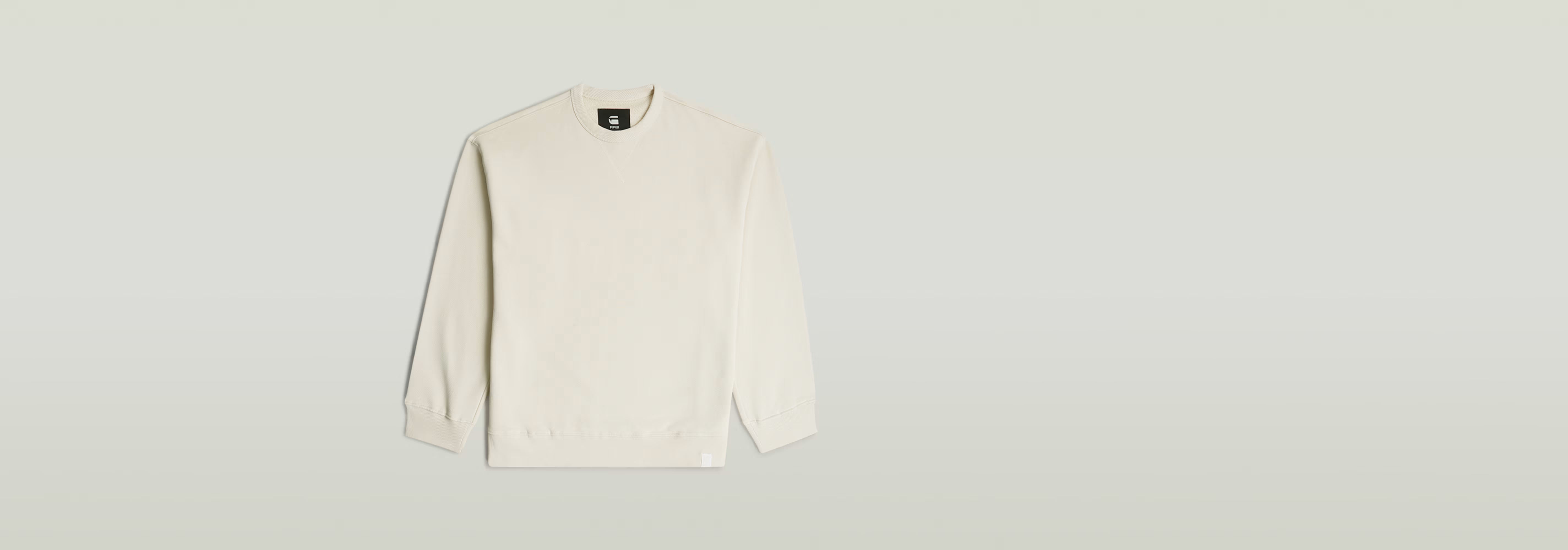 Sudadera GS-01 Relaxed en color blanco, corte relajado, cuello redondo y manga larga, 100% algodón ecológico.