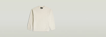 Sudadera GS-01 Relaxed en color blanco, corte relajado, cuello redondo y manga larga, 100% algodón ecológico.