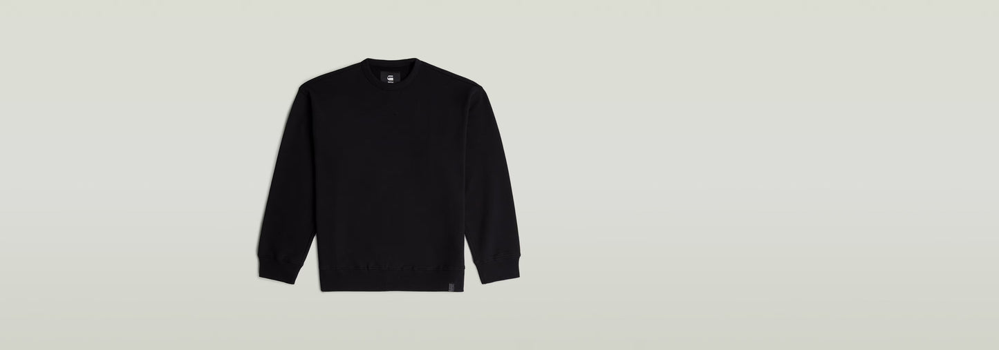 Sudadera GS-01 Relaxed en color negro con diseño moderno y corte relajado.
