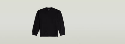 Sudadera GS-01 Relaxed en color negro con diseño moderno y corte relajado.