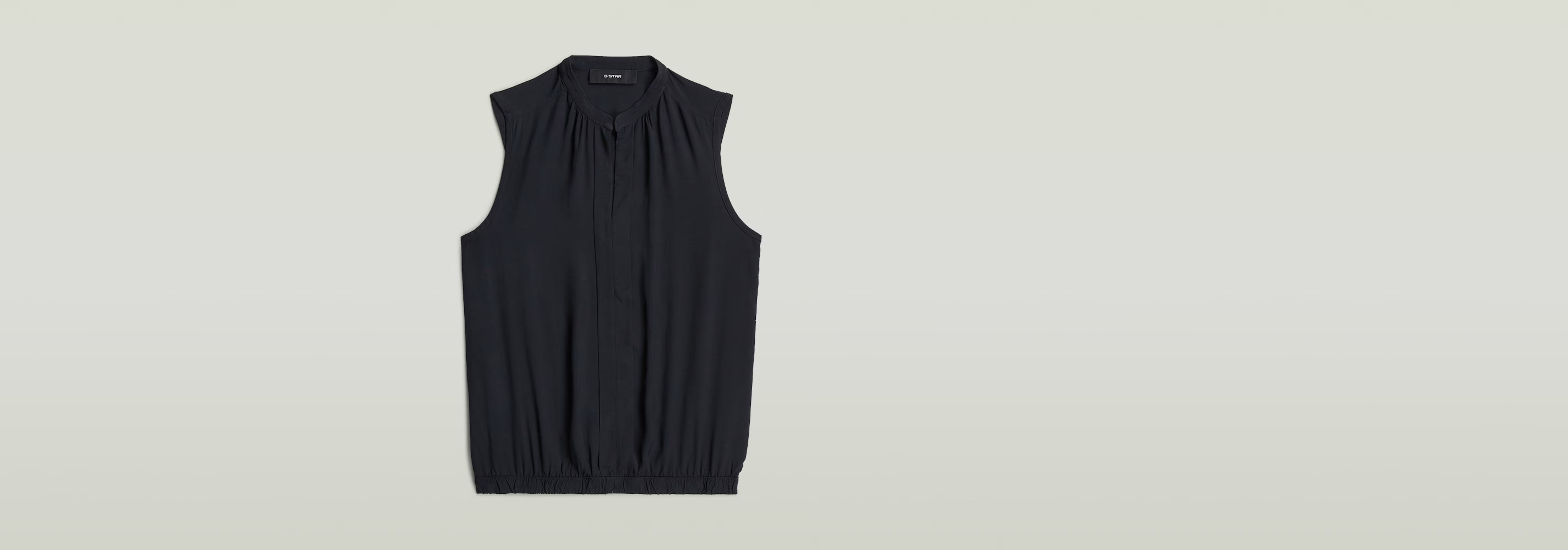 Top sin mangas Stand Up Collar en color negro con cuello mao y diseño sin mangas.
