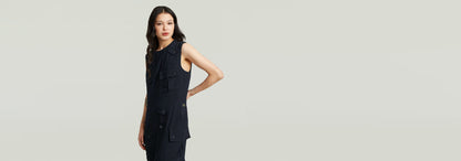 Vestido Long Pocket en color negro con bolsillos y tirantes anchos, ideal para un look elegante y práctico.