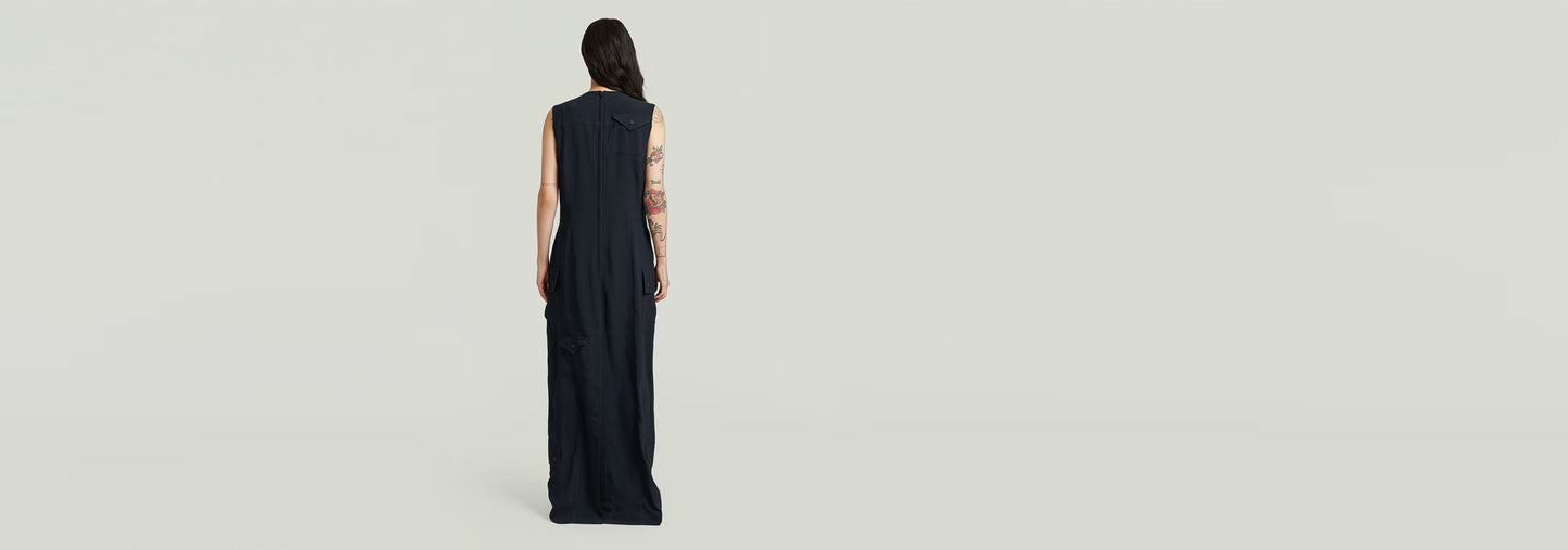 Vista trasera del Vestido Long Pocket, elegante y práctico, con tirantes anchos y diseño de bolsillo.