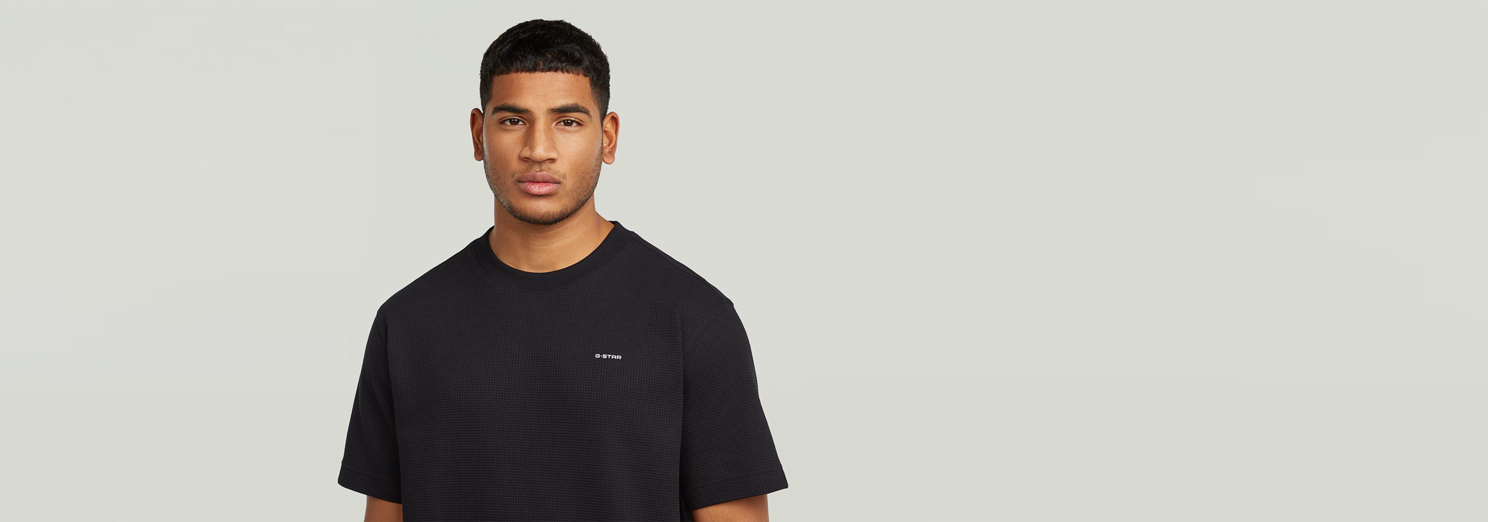 Waffle True Regular T-Shirt on a model, showcasing its classic design and comfortable fit.